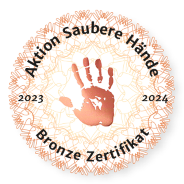 Bronze Zertifikat der Aktion Saubere Hände für 2023 bis 2024 mit roter Handabdruck in der Mitte
